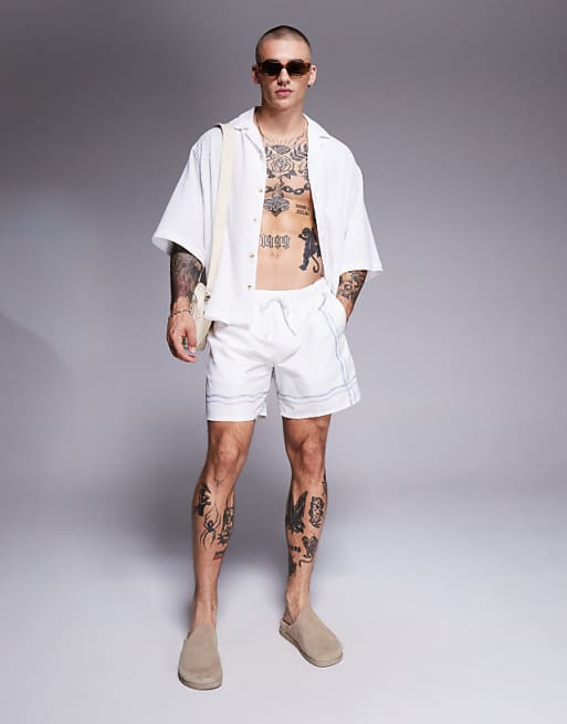 ASOS DESIGN Swim Shorts In Mid Length In Stone With Border Print