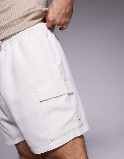ASOS DESIGN Swim Shorts In Mid Length With Cargo Pockets In Neutral