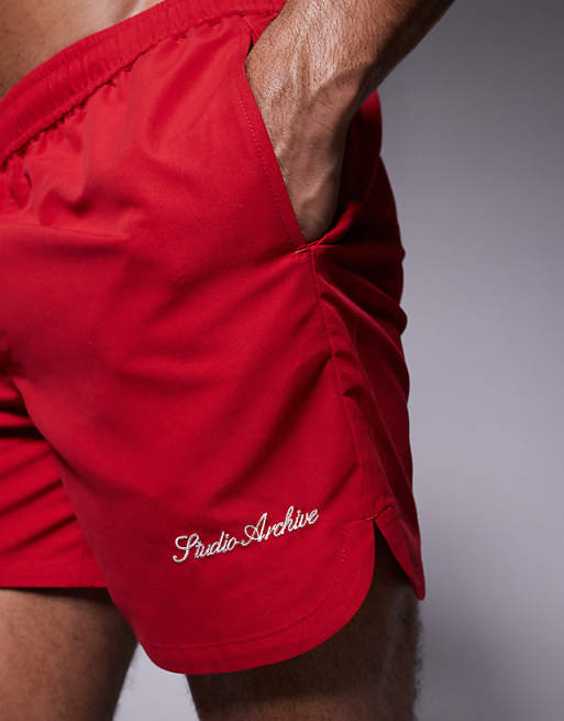ASOS DESIGN Swim Shorts In Mid Length With Embroidery In Red