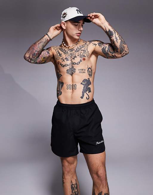 ASOS DESIGN swim shorts in mid length with embroidery placement in black