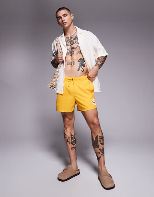 ASOS DESIGN Swim Shorts In Short Length In Yellow