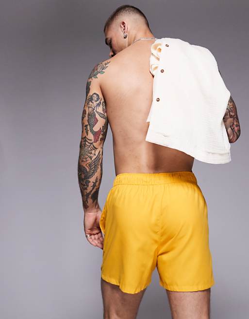 ASOS DESIGN Swim Shorts In Short Length In Yellow