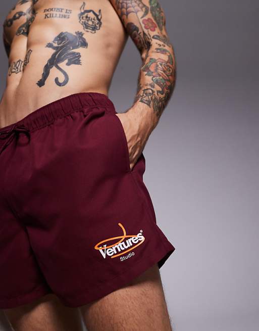 ASOS DESIGN Swim Shorts In Short Length With Placement Print In Burgundy
