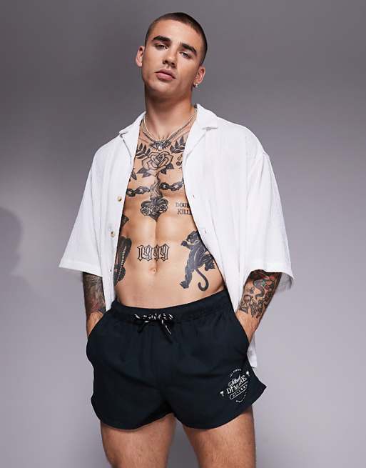 ASOS DESIGN swim shorts in super short length in black and white print