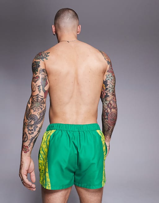 ASOS DESIGN Swim Shorts In Super Short Length With Placement Animal Print In Green