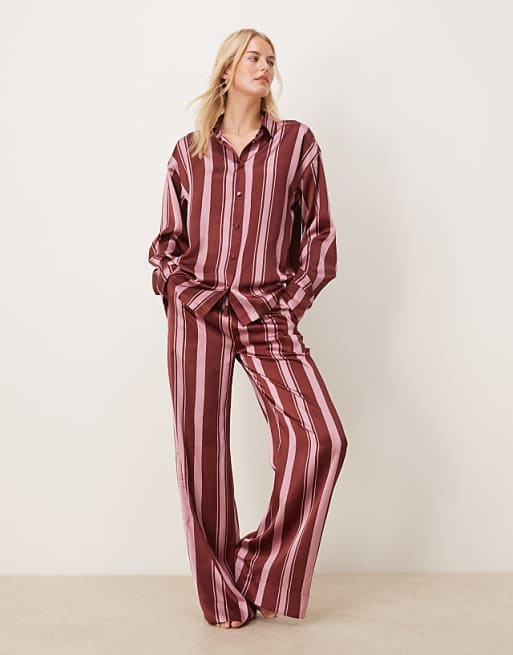 ASOS DESIGN Tall oversized satin stripe shirt and trouser pyjama set in burgundy stripe