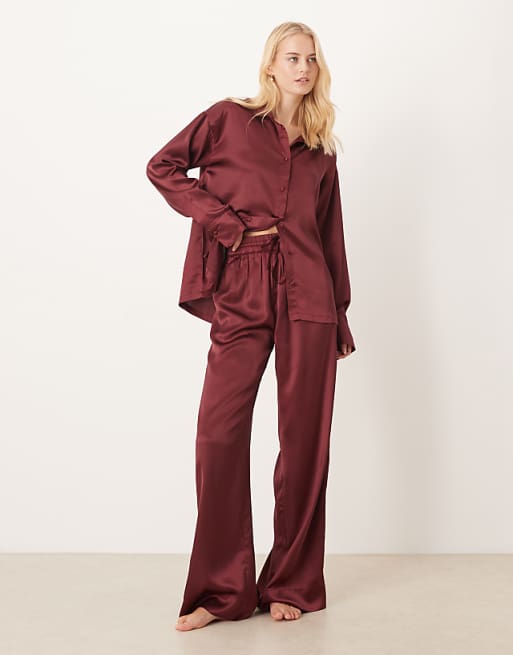 ASOS DESIGN Tall satin shirt and trouser pyjama set in burgundy