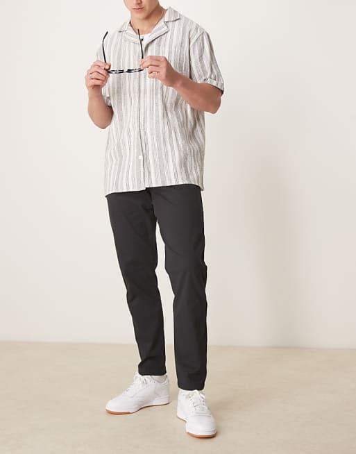ASOS DESIGN tapered chinos in black
