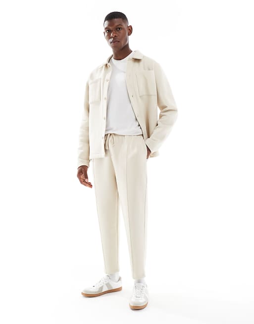 ASOS DESIGN Tapered Fit Fixed Hem Joggers With Pleats In Stone