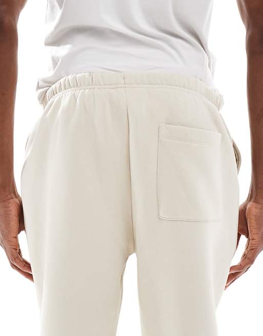 ASOS DESIGN Tapered Fit Fixed Hem Joggers With Pleats In Stone