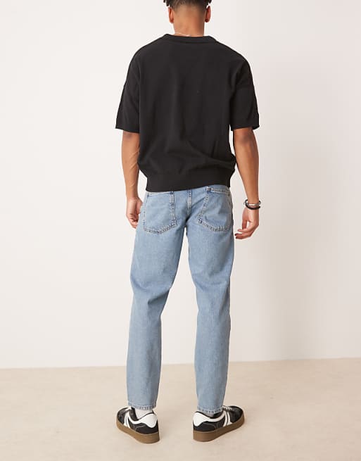 ASOS DESIGN Tapered Fit Jeans In Light Wash Blue
