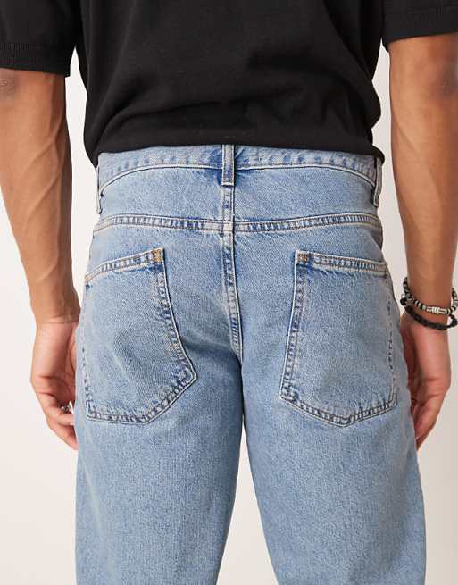 ASOS DESIGN Tapered Fit Jeans In Light Wash Blue