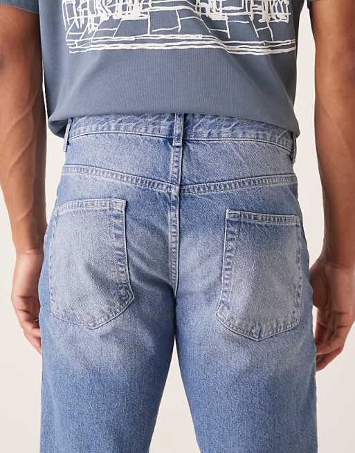 ASOS DESIGN Tapered Fit Jeans In Light Wash Blue
