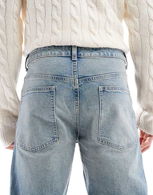 ASOS DESIGN Tapered Fit Jeans In Light Wash Blue