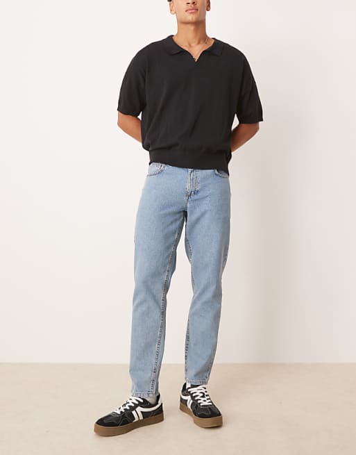 ASOS DESIGN tapered fit jeans in light wash blue