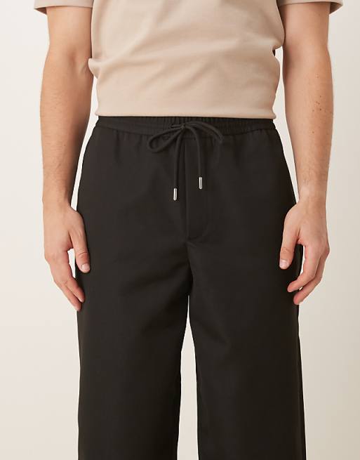 ASOS DESIGN Tapered Fit Smart Trousers With Elasticated Waistband In Black