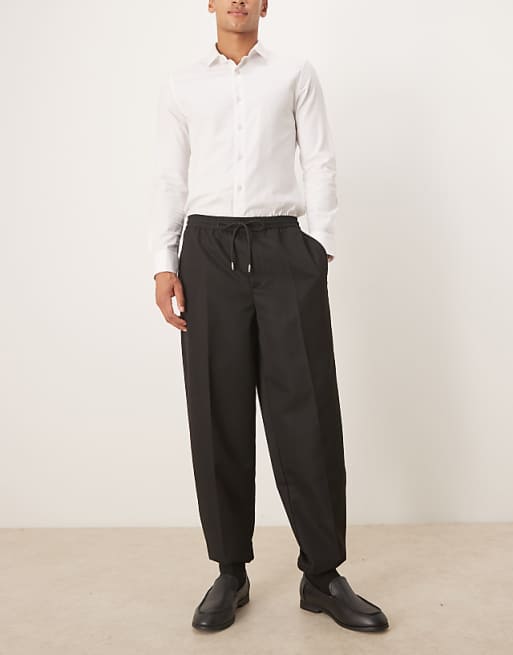 ASOS DESIGN Tapered Fit Trouser With Elasticated Waist And Cuffs In Black