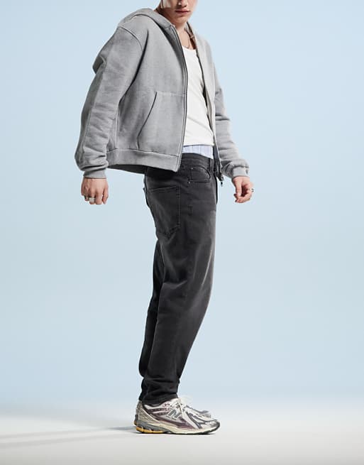 ASOS DESIGN Tapered Jeans In Black Wash