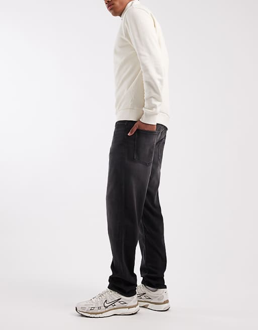 ASOS DESIGN Tapered Jeans In Black Wash With Stretch