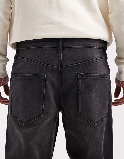 ASOS DESIGN Tapered Jeans In Black Wash With Stretch