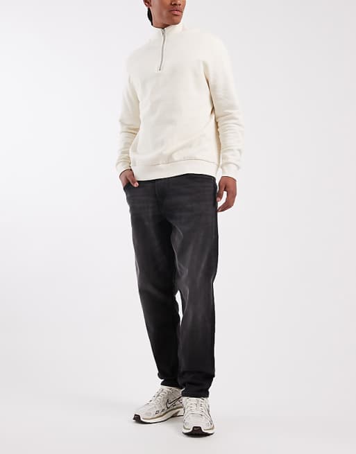 ASOS DESIGN tapered jeans in black wash with stretch