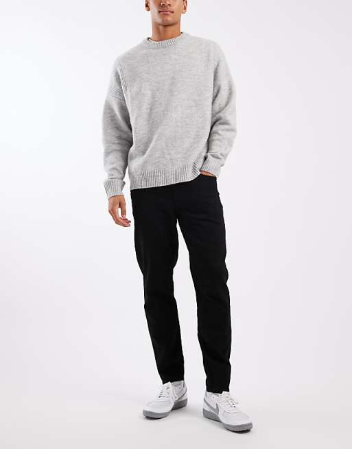 ASOS DESIGN tapered jeans in black