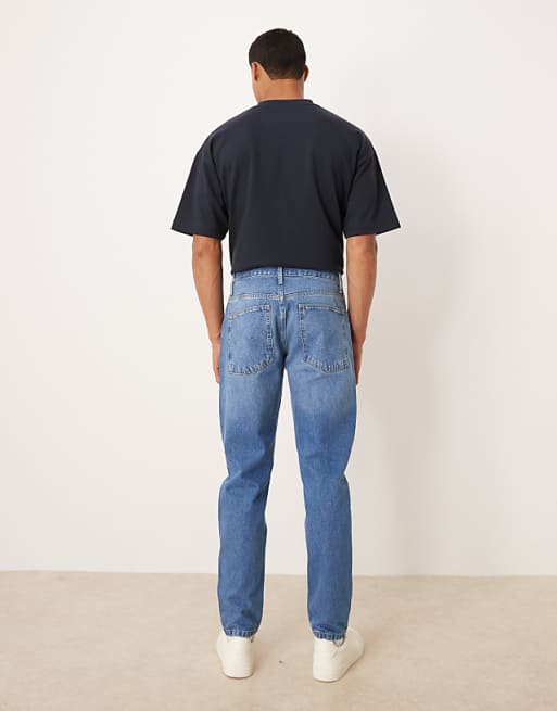 ASOS DESIGN Tapered Jeans In Mid Wash