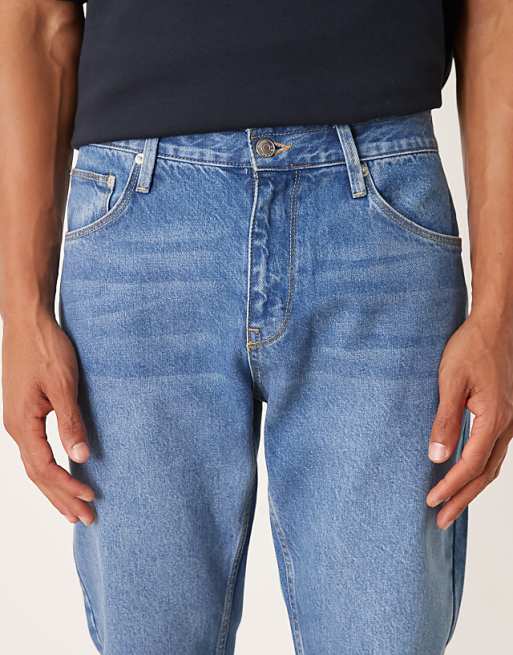 ASOS DESIGN Tapered Jeans In Mid Wash