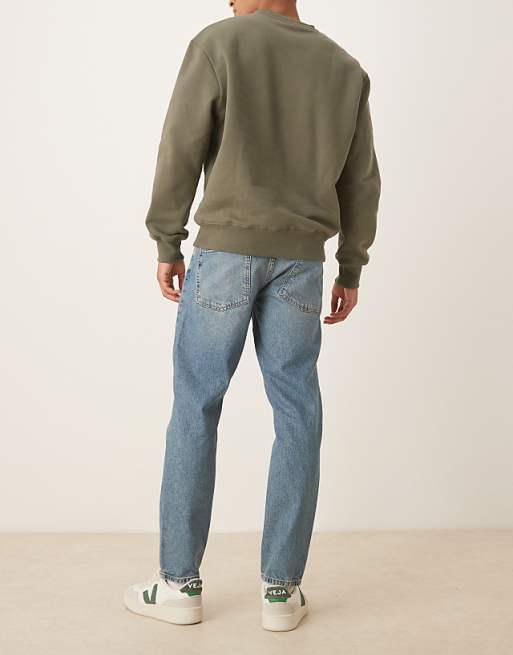 ASOS DESIGN Tapered Jeans In Mid Wash Blue