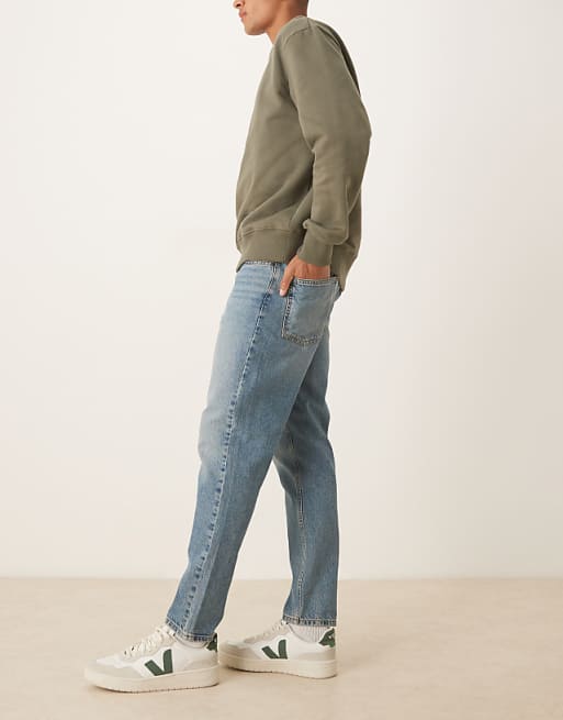 ASOS DESIGN Tapered Jeans In Mid Wash Blue
