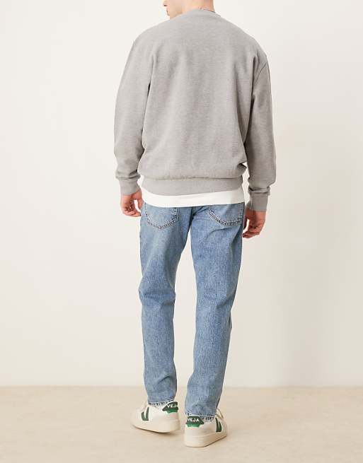 ASOS DESIGN Tapered Jeans In Mid Wash Blue