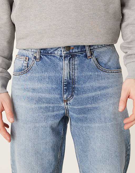 ASOS DESIGN Tapered Jeans In Mid Wash Blue