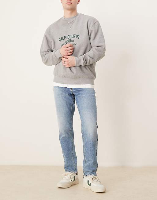 ASOS DESIGN tapered jeans in mid wash blue