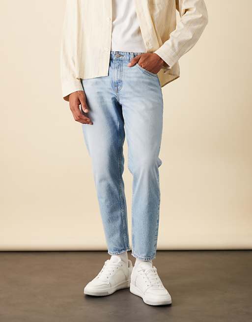 ASOS DESIGN Tapered Jeans In Mid Wash Blue