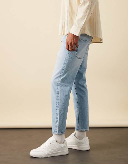 ASOS DESIGN Tapered Jeans In Mid Wash Blue