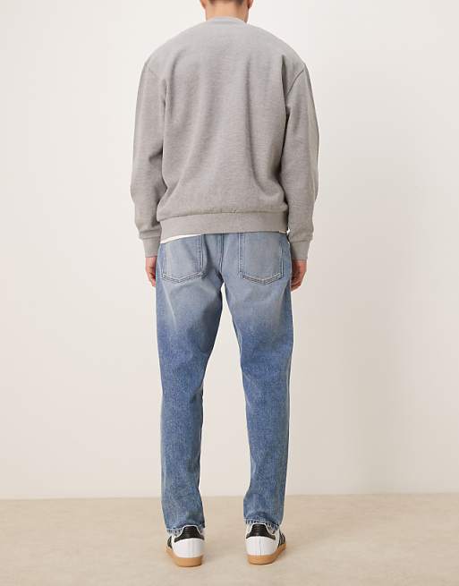 ASOS DESIGN Tapered Jeans In Mid Wash Blue