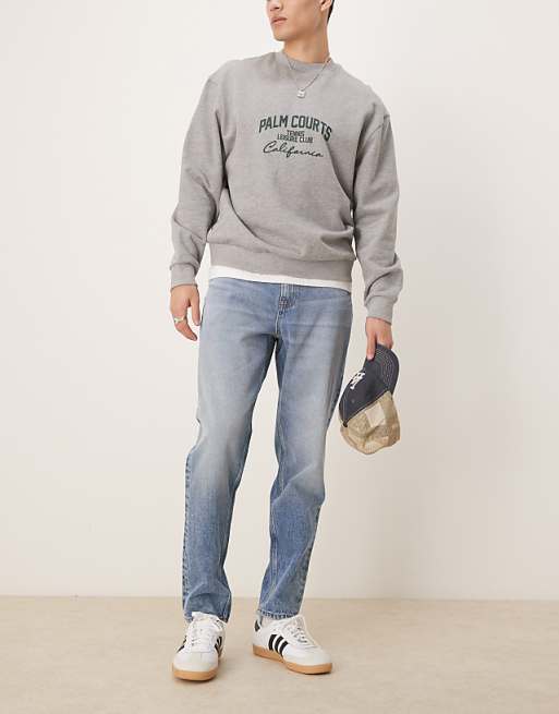 ASOS DESIGN tapered jeans in mid wash blue