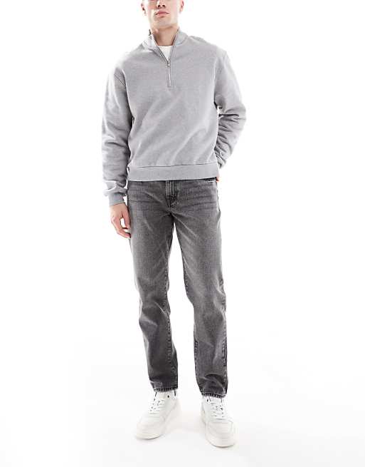 ASOS DESIGN tapered jeans in washed grey