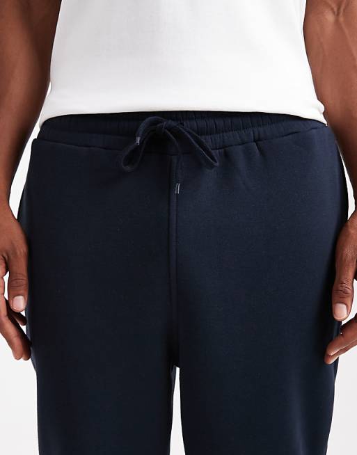 ASOS DESIGN Tapered Joggers In Navy