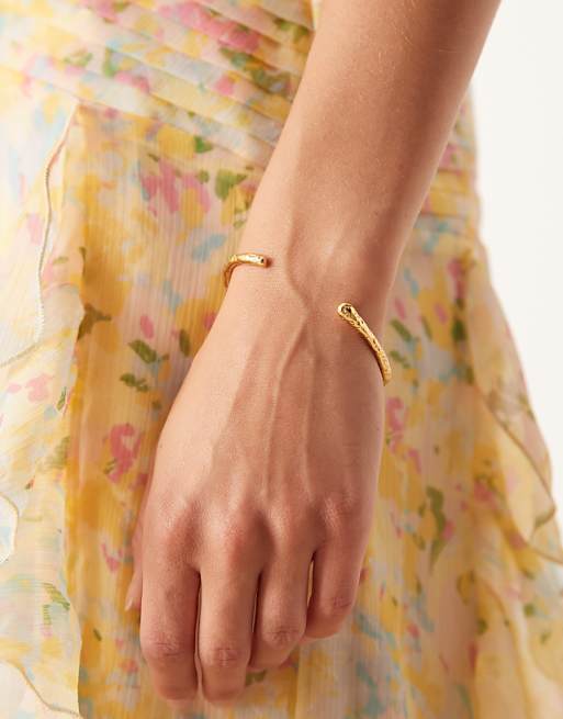 ASOS DESIGN waterproof stainless steel cuff bangle with molten design in gold tone