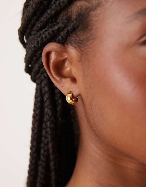 ASOS DESIGN waterproof stainless steel mini huggie hoops in gold tone
