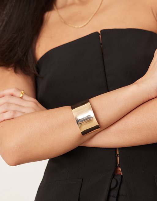 ASOS DESIGN wide cuff bracelet in gold tone