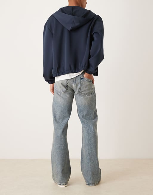 ASOS DESIGN Wide Flare Jeans In Light Wash Blue With Tint