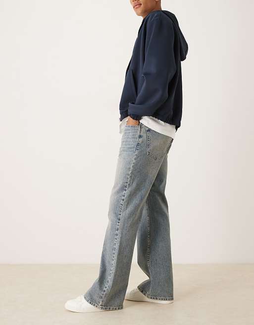 ASOS DESIGN Wide Flare Jeans In Light Wash Blue With Tint