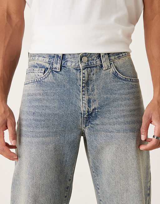 ASOS DESIGN Wide Flare Jeans In Light Wash Blue With Tint