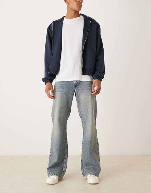 ASOS DESIGN wide flare jeans in light wash blue with tint