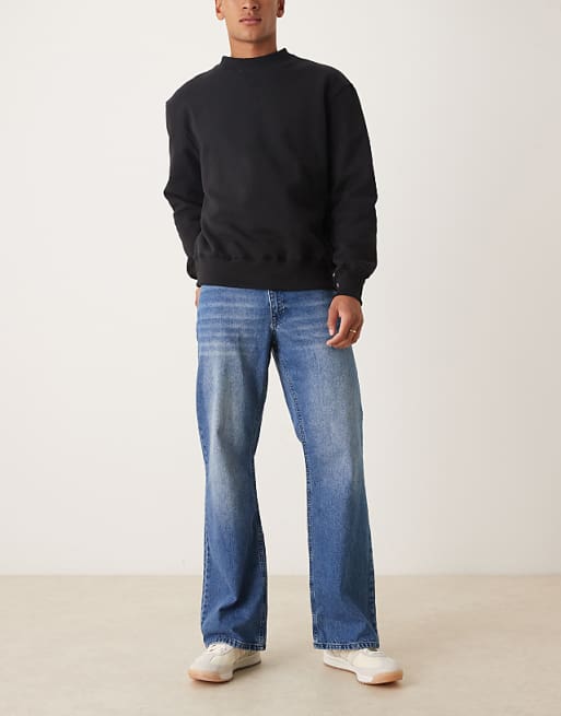 ASOS DESIGN wide flare jeans in mid wash blue