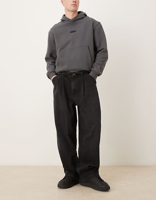 ASOS DESIGN wide leg jeans in black with pleats and belt