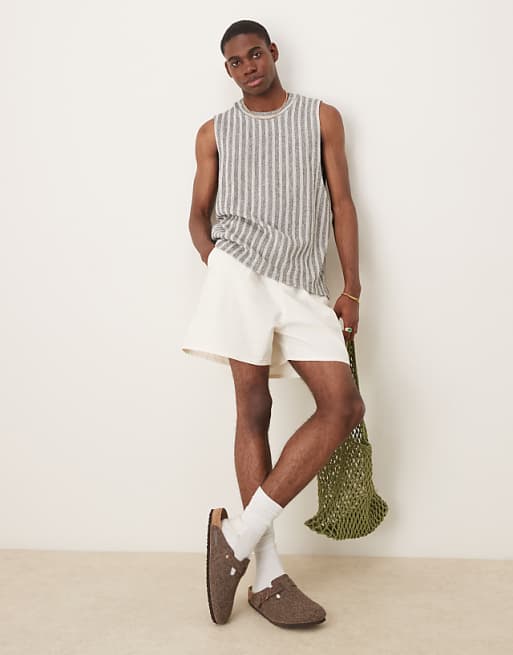 ASOS DESIGN wide shorter length pleated shorts with drawstring in white