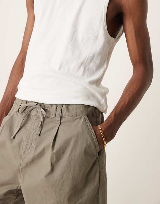 ASOS DESIGN Wide Shorter Length Shorts In Khaki With Pleats And Drawstring